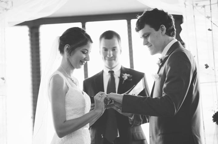 P.S. Here is a picture from the ceremony.  The cute pastor is my husband.