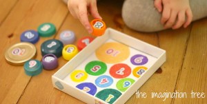 playing+with+bottle+top+game